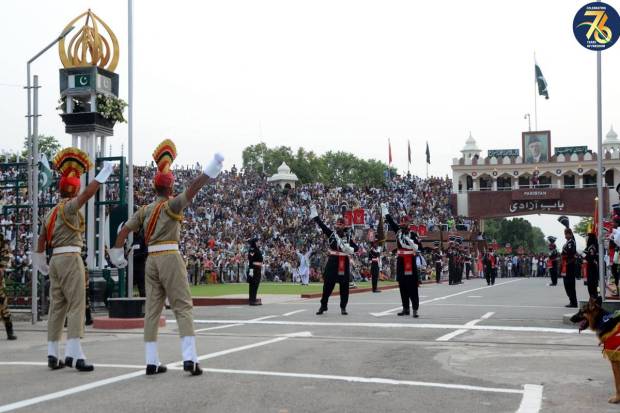 Border Security Force (BSF) and Pakistani Rangers personnel during the beating retreat ceremony on the occasion of India's 77th Independence Day at the Attari-Wagah border. (PTI Photo)
