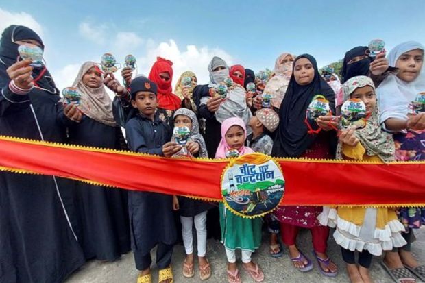 Muslim women and children display a 'Chandrayaan-3' themed Rakhi ahead of the Raksha Bandhan festival in Bhopal. This auspicious festival is a sacred reflection of our culture. (PTI Photo) 