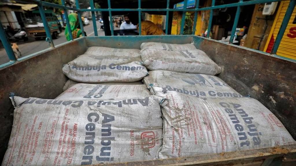 Ambuja Cements, Ambuja Cements Q3 results, quarter earnings, profit, revenue, EBITDA, cement industry, acquisition