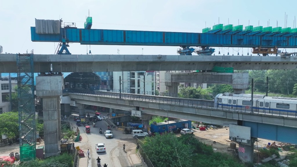 Delhi-Ghaziabad-Meerut rrts, Delhi-Ghaziabad-Meerut rrts corridor, delhi metro blue line, rrts highest viaduct, ncrtc, RRTS viaduct crossing over New Ashok Nagar Metro station, rapidx, rapidx launch, New Ashok Nagar RRTS station, New Ashok Nagar RRTS station significance,