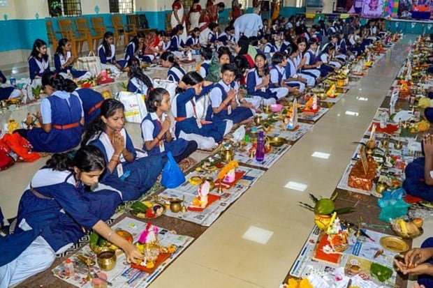 School students offer prayer to Lord Ganesha in Bhubaneswar. (Image: PTI)