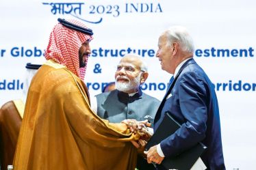  Saudi Arabian Crown Prince Mohammed Bin Salman Al Saud and US President Joe Biden shake hands next to Prime Minister Narendra Modi
