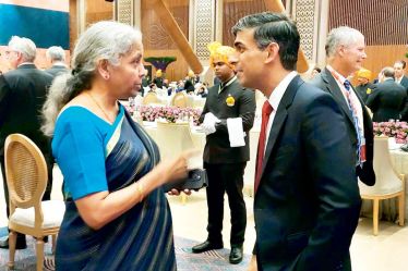 Union Finance Minister Nirmala Sitharaman and UK Prime Minister Rishi Sunak at the grand dinner hosted by President of India Droupadi Murmu