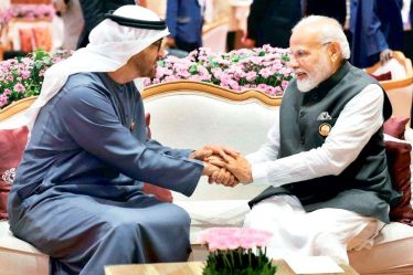 Prime Minister Narendra Modi shares a light moment with UAE President Sheikh Mohamed Bin Zayed Al Nahyan