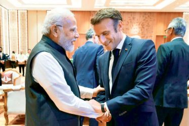 French President Emmanuel Macron meets Prime Minister Narendra Modi