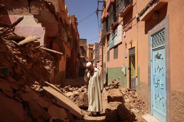 Mohamed Sebbagh, 66, stands in front of his destroyed house, in the aftermath of a deadly earthquake, in Amizmiz, Morocco. (Reuters)
