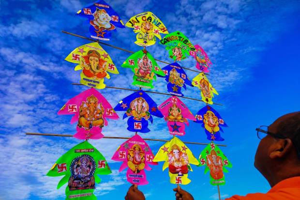 A miniature kite featuring images of Hindu Lord Ganesha, made by Kites maker Jagmohan Kanojia, is on display to mark Ganesh Chaturthi festival, in Amritsar. (PTI Photo)