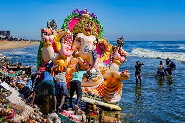 Idols of Lord Ganesha, that were immersed at Pattinapakkam beach during the 'Ganesh Chaturthi' festival, drift ashore, in Chennai. (PTI Photo)