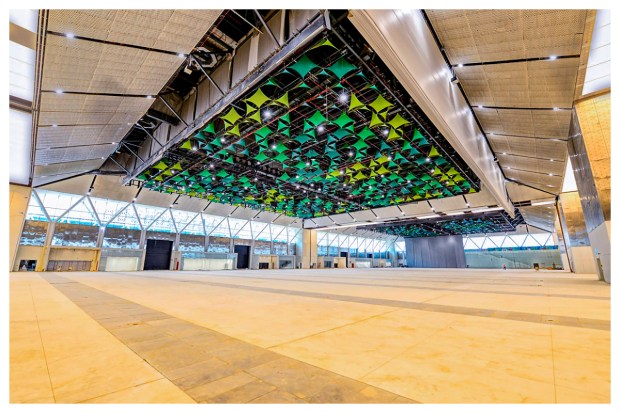 The grand foyer, connected to the exhibition halls, showcases a distinctive copper ceiling that filters light through various skylights. (Image: PTI)