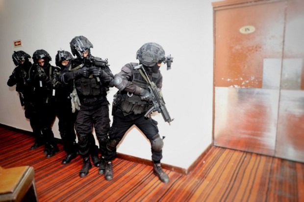 National Security Guard (NSG) personnel during a security drill ahead of the G20 Summit. (Image: PTI)