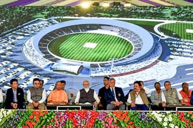 PM Narendra Modi with Uttar Pradesh Chief Minister Yogi Adityanath, BCCI President Roger Binny, BCCI Vice President Rajeev Shukla, BCCI Secretary Jay Shah and former cricketers Sunil Gavaskar, Ravi Shastri, Sachin Tendulkar and Kapil Dev during the foundation stone laying ceremony of an international cricket stadium, in Varanasi. (PTI Photo)