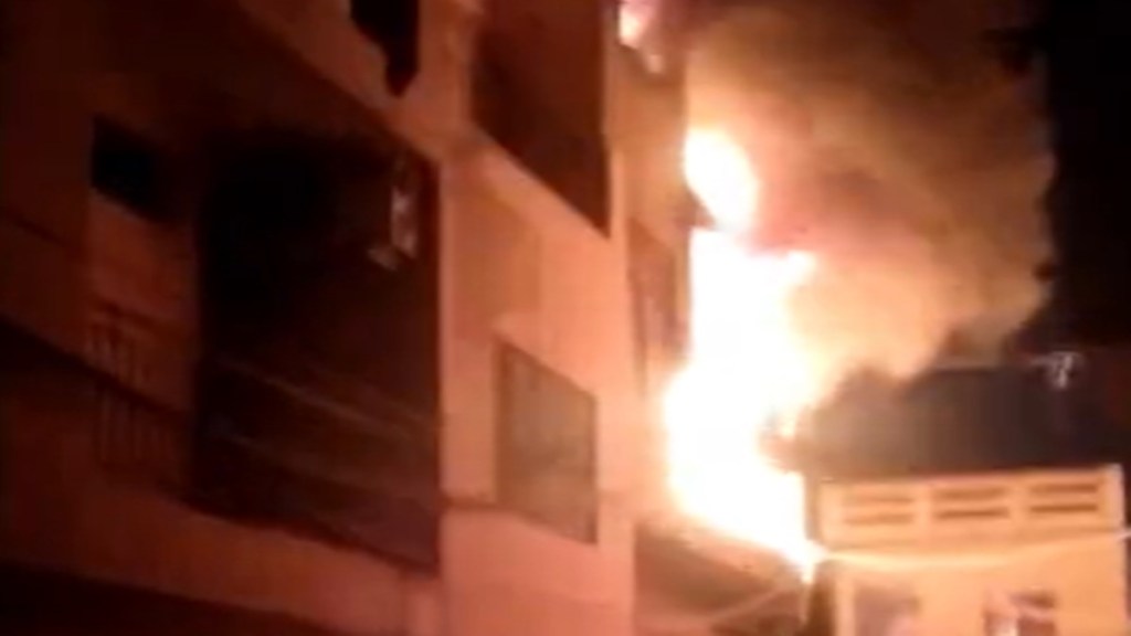 A fire broke out in Sangam Vihar on Tuesday. (Image: Screengrab/PTI) A fire broke out in Sangam Vihar on Tuesday. (Image: Screengrab/PTI)