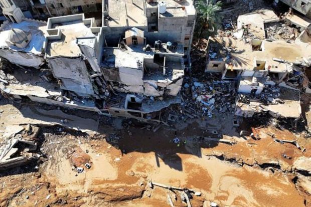 A view shows damaged buildings, in the aftermath of the floods in Derna. The storm also killed about 170 people elsewhere in the country. The flooding swept away entire families in Derna on Sunday night and exposed vulnerabilities in the oil-rich country that has been mired in conflict since a 2011 uprising that toppled long-ruling dictator Moammar Gadhafi. (Marwan Alfaituri/via REUTERS)