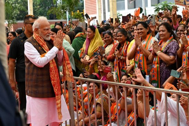 Narendra Modi being welcomed at the Bharatiya Janata Party headquarters, where he was felicitated. Parliament has approved landmark legislation that reserves 33% of the seats in its powerful lower house and in state legislatures for women to ensure more equal representation, ending a 27-year impasse over the bill amid a lack of consensus among political parties. (AP Photo)