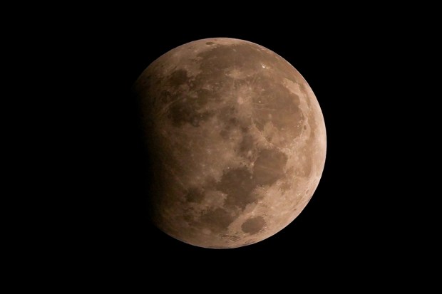 A penumbral lunar eclipse occurs when part or all of the moon passes into the Earth's penumbra or partially shaded outer region of the shadow. Partial lunar eclipse as seen from Kolkata. (PTI Photo)