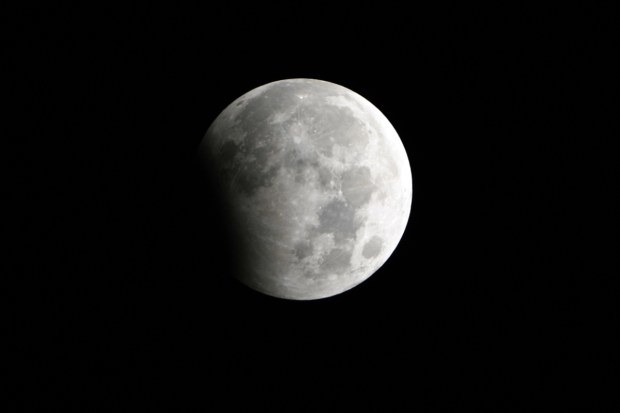 A partial lunar eclipse is seen in Lahore, Pakistan. (AP Photo)
