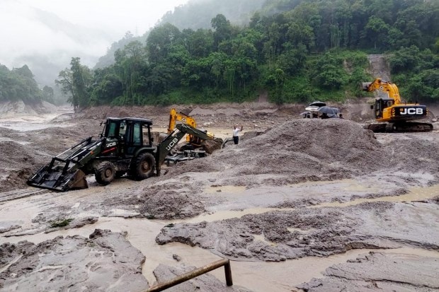Chungthang town bore the maximum brunt of the flood with 80 per cent of it getting severely affected. The NH-10, considered the lifeline of the state, sustained extensive damage at several places. (Reuters Photo)