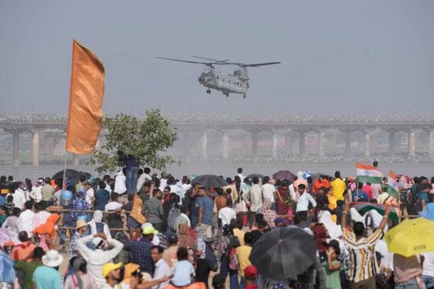 An IAF Chinook helicopter flies during Air Force Day celebrations at Sangam, the holy confluence of river Ganga, Yamuna and the mythical Saraswati, in Prayagraj. (AP Photo)