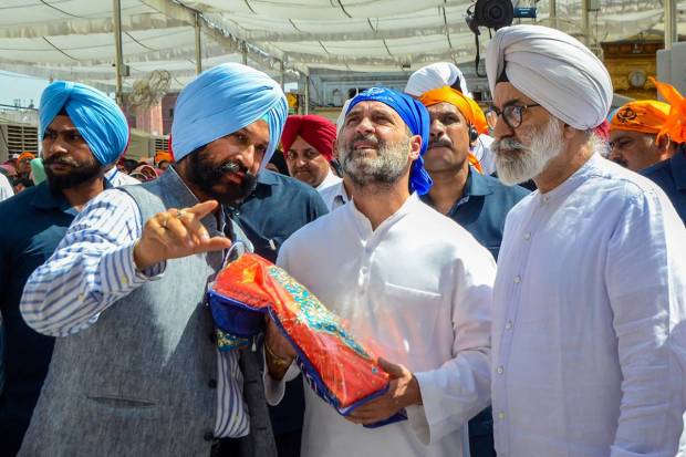 Congress leader Rahul Gandhi pays obeisance at the Golden Temple, in Amritsar. (PTI Photo)