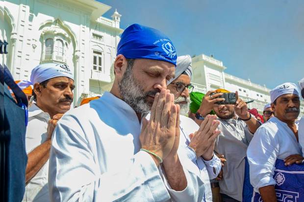 Congress leader Rahul Gandhi pays obeisance at the Golden Temple, in Amritsar. (PTI Photo)