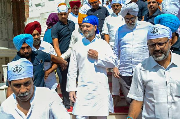 Congress leader Rahul Gandhi pays obeisance at the Golden Temple, in Amritsar. (PTI Photo)