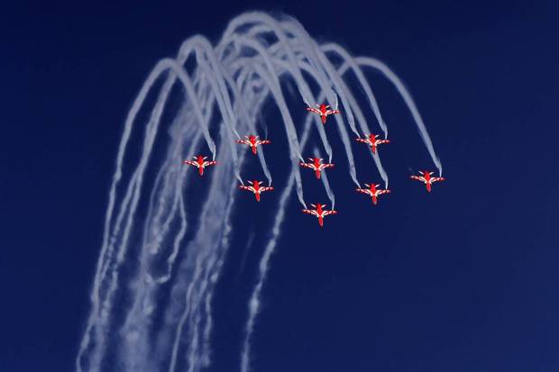 Indian Air Forces (IAF) 'Surya Kiran' aerobatic team performs during the 91st Air Force Day celebrations, in Prayagraj. (PTI Photo)