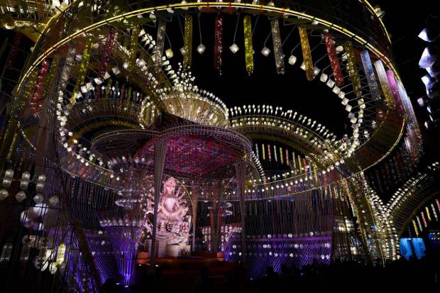 Kolkata: A community Durga Puja pandal illuminated with lights. (PTI)