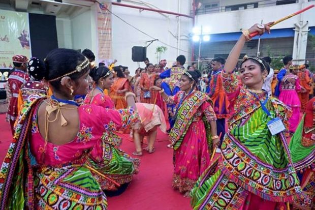 Differently-abled kids play Garaba and Dandiya during the Navratri celebrations at Andheri in Mumbai. (PTI Photo)