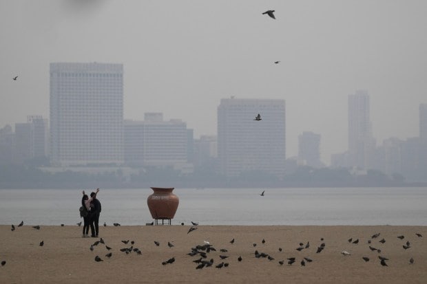 A view of the city skyline engulfed in smog in Mumbai. (PTI Photo)
