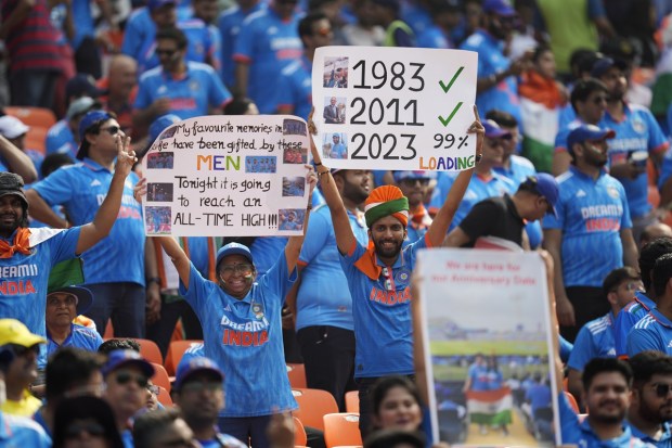Indian fans before the start of the ICC Men’s Cricket World Cup 2023 final between India and Australia, at the Narendra Modi Stadium. (AP Photo)