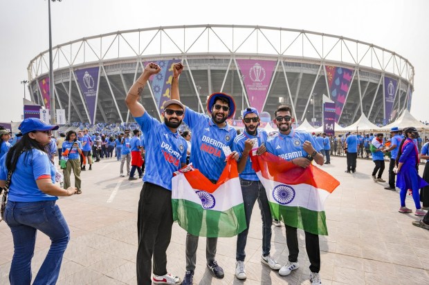 Fans wearing the India jersey, carrying the Indian flag, laughing, joking and anticipating an India win are moving towards the Narendra Modi stadium. (PTI Photo)
