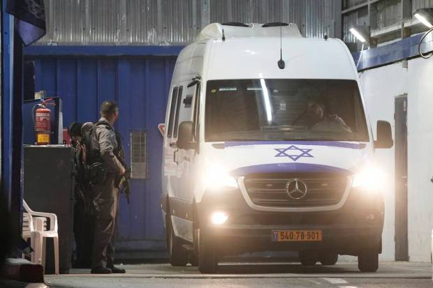 An Israeli prison transport vehicle carries Palestinian prisoners released by the Israeli authorities from Ofer military prison near Jerusalem. (AP/PTI)