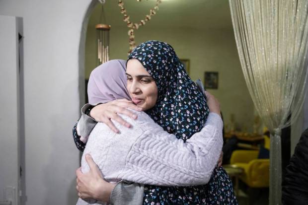 Marah Bakir, right, a former Palestinian prisoner who was released by the Israeli authorities, is welcome at her family house in the east Jerusalem neighborhood of Beit Hanina. (AP/PTI)