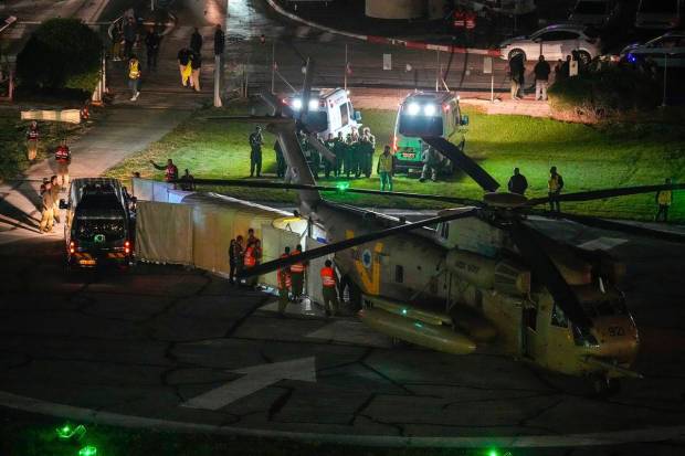 A helicopter carrying hostages released by Hamas lands at Schneider Children's Medical Center in Petah Tikva, Israel on Friday.(AP Photo)