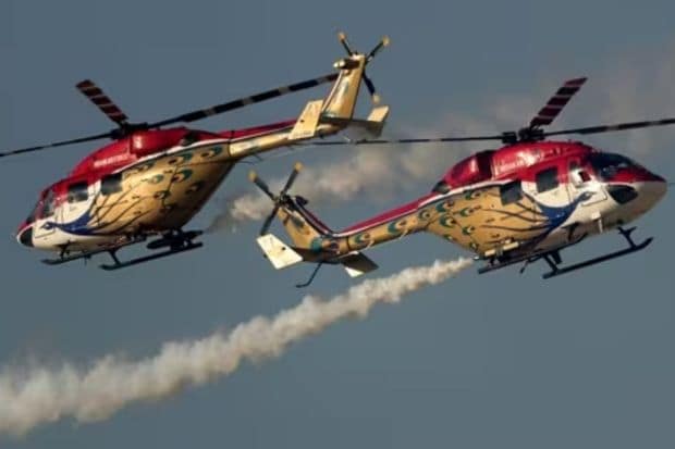 Sarang helicopter display team from India, perform during second day of the Dubai Air Show, United Arab Emirates.(AP)