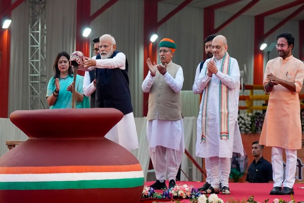 Prime Minister Narendra Modi during an event marking the culmination of the 'Meri Maati Mera Desh' campaign, in New Delhi. Union Ministers Amit Shah, Arjun Ram Meghwal, Meenakashi Lekhi, Anurag Thakur, G. Kishan Reddy and Nisith Pramanik are also seen. (PTI Photo)