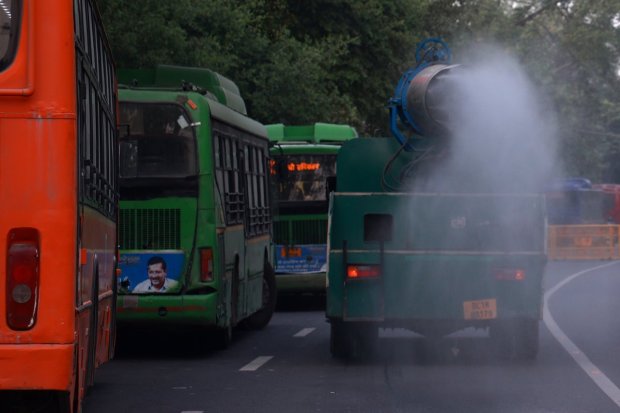 Anti-smog guns spray water in different parts of the city to control pollution. (Express Photo)