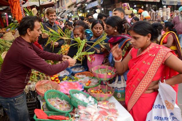 People shop for the Chhath Puja celebration, in Amritsar. (PTI Photo)