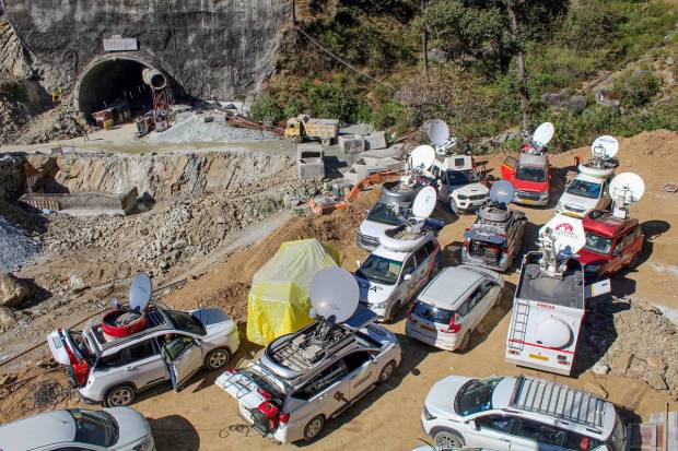Media vehicles parked near the under-construction tunnel between Silkyara and Dandalgaon on the Brahmakhal-Yamunotri national highway in Uttarkashi district. (PTI Photo)