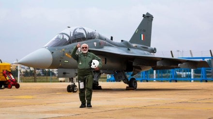 PM modi on tejas, latest pictures of modi, PM modi on tejas, tejas latest news, PM modi flies tejas, picture gallery, latest news, top news, defence news,