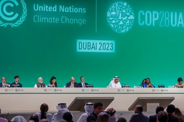 Modi highlights India's achievements and ambitions in reducing emissions intensity, increasing non-fossil fuel capacity, and becoming a net zero economy by 2070. (PTI photo)