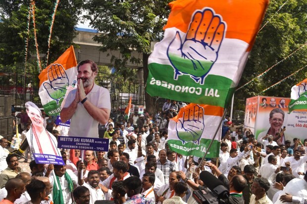 Hyderabad: Congress workers and supporters celebrate the party's lead during counting of votes for Telangana Assembly elections, outside Gandhi Bhavan in Hyderabad. (PTI Photo)