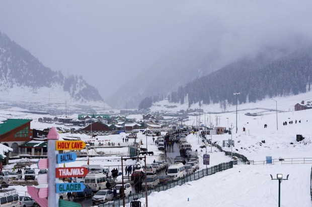 Sonamarg: Tourists at snow-covered Sonamarg after fresh snowfall, in Ganderbal district. (PTI Photo)