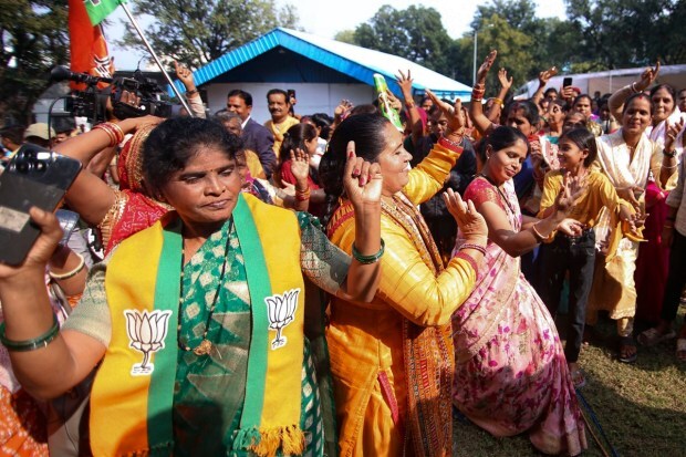 Bhopal: BJP workers and supporters celebrate the party's lead during counting of votes for Madhya Pradesh Assembly elections, in Bhopal. (PTI Photo)