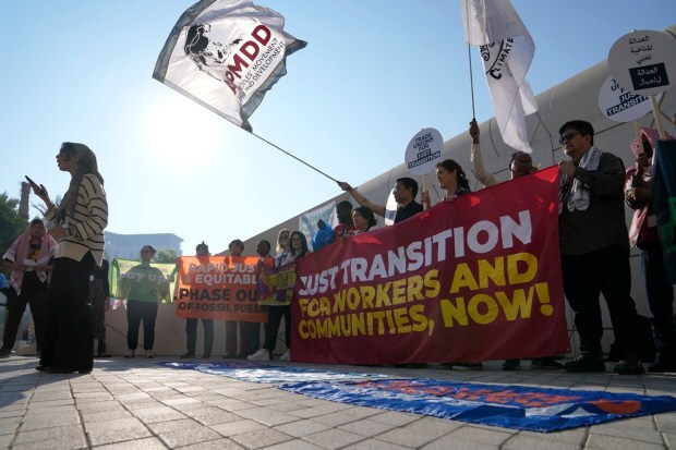 The Emirati government and the organization in charge of COP28 did not comment on the protest. (AP Photo)