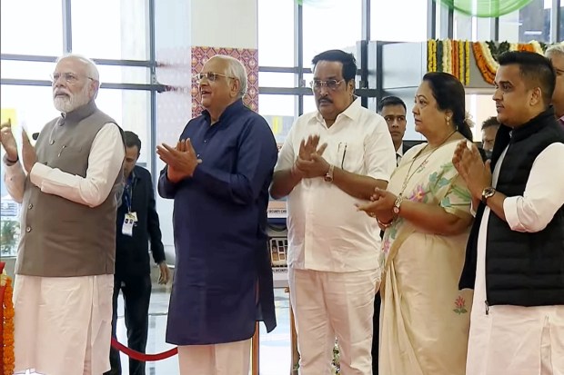 The terminal building reflects the local culture and heritage of Surat city in its interior and exterior design. PM Modi was accompanied by several Gujarat and central leaders during his visit. (PTI Photo)