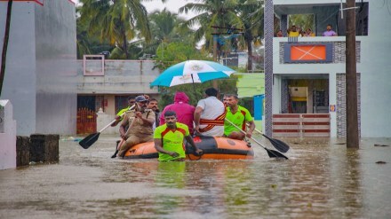 People trapped in floodwater being shifted by rescue officials to a safer place as heavy rains continue, in Kanyakumari district, Sunday, Dec. 17, 2023. (PTI Photo) 