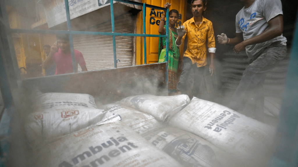 Ambuja Cements, Adani Group, capital infusion, warrant subscription, shareholding, capacity addition