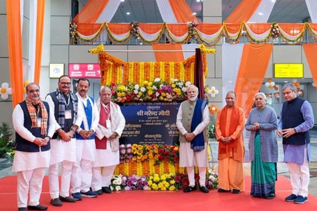 PM Modi with UP CM Yogi Adityanath, Deputy CM Keshav Prasad Maurya, Union Railways Minister Ashwini Vaishnaw and others during the inauguration of the redeveloped Ayodhya Dham Station. (Image: PTI)
