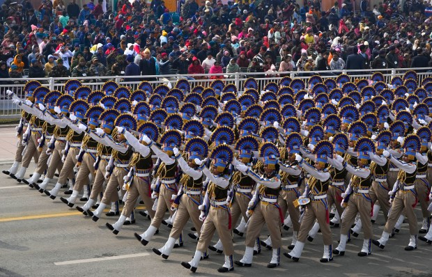 Women personnel of Central Reserve Police Force during the full dress rehearsal for the Republic Day Parade 2024 at the Kartavya Path. (PTI)